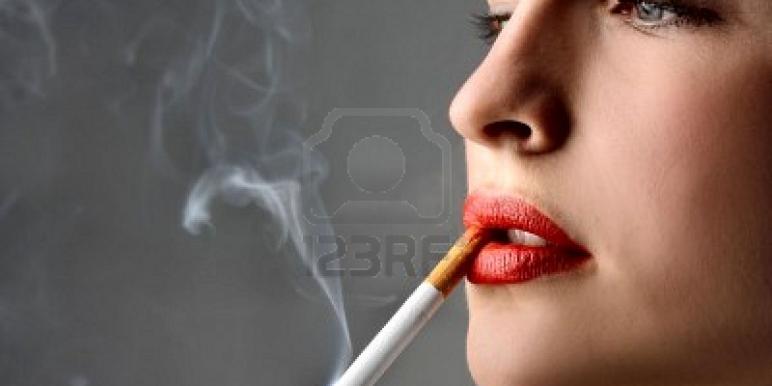 5619763-young-woman-smoking-a-cigarette.jpg 5619763-young-woman-smoking-a-cigarette.jpg